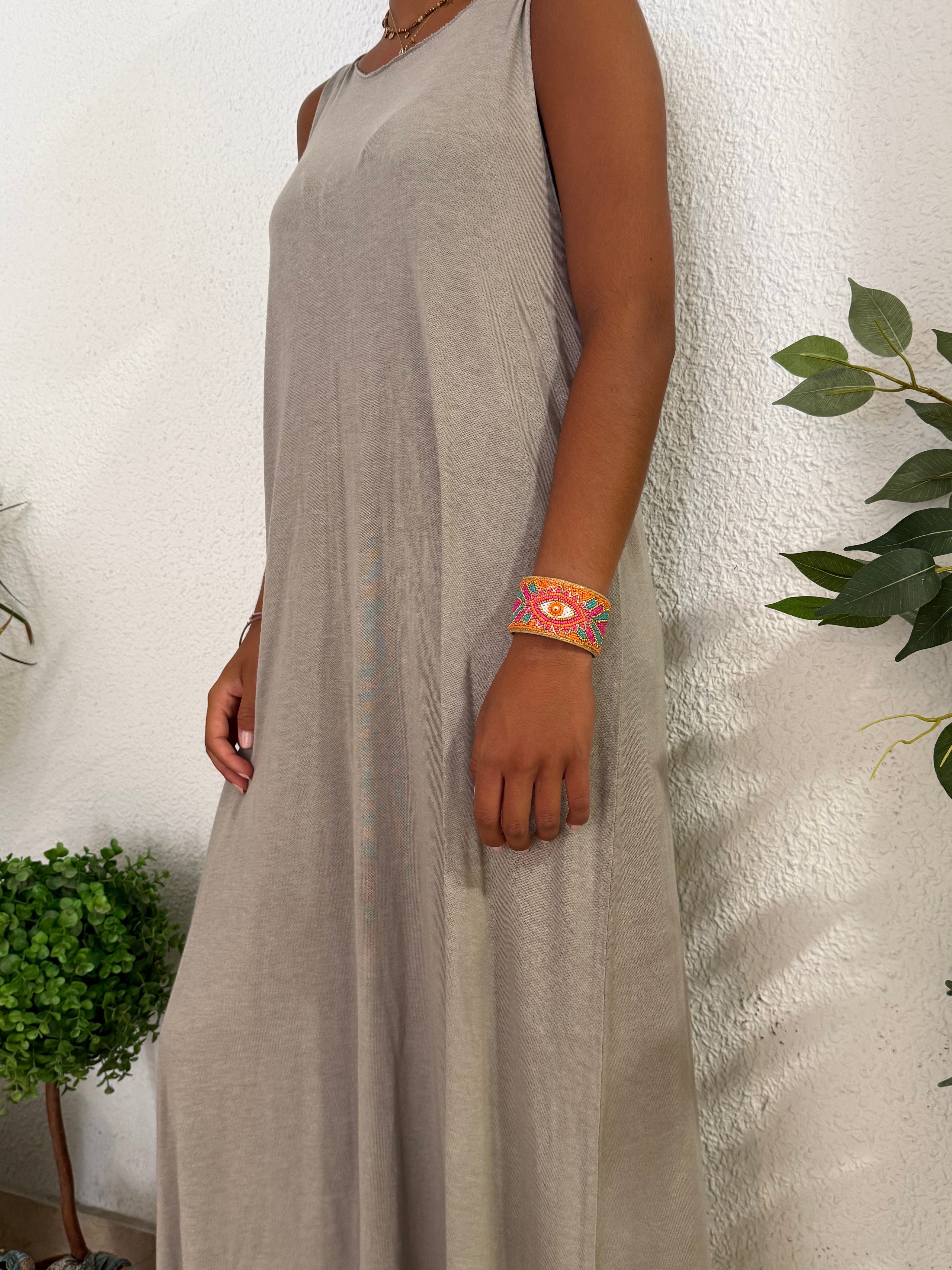 Brazalete "Occhio" naranja y fucsia
